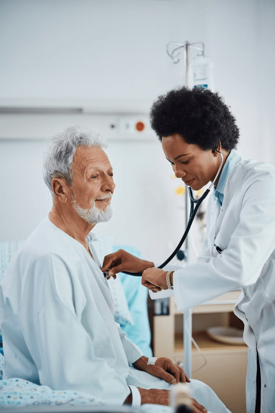 Doctor examining patient in hospital